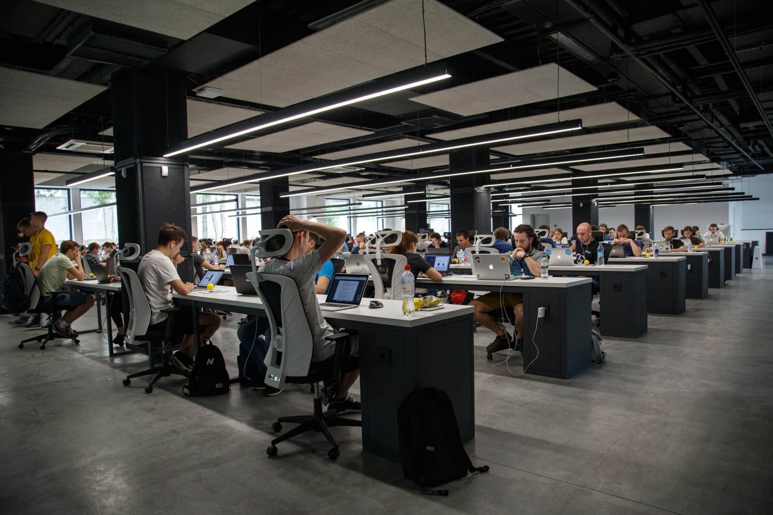 People in an office working at their desk